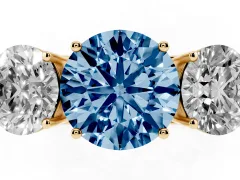 Fancy Blue Round Cut Diamond Three-Stone Ring Set in Yellow gold with Textured Band