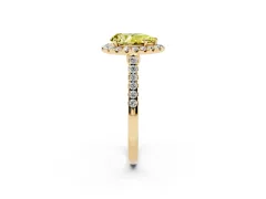 Fancy Yellow Pear Cut Diamond Halo Pavé Engagement Ring Set in Yellow gold with Prong Setting