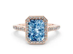 Fancy Blue Radiant Cut Diamond Halo Engagement Ring Set in Rose gold with Round Pavé Shoulders and Heart Gallery