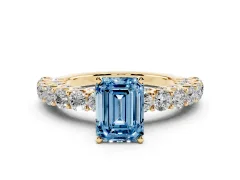Fancy Blue Emerald Cut Diamond Solitaire Ring Set in Yellow gold with Shared Prong Pavé Band