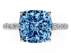 Fancy Blue Cushion Cut Diamond Solitaire Engagement Ring Set in Platinum with Round Pavé Band and Prong Setting