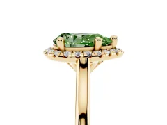 Fancy Green Pear Cut Diamond Halo Engagement Ring Set in Yellow gold with Pavé Band and Rising Shoulders