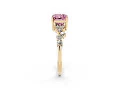 Fancy Pink Radiant Cut Diamond Ring Set in Yellow gold with Scattered Round Accents
