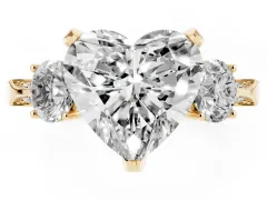 Heart Cut Diamond Three-Stone Ring Set in Yellow gold with Pavé Band and Smaller Side Stones