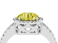 Fancy Yellow Round Cut Diamond Halo Ring Set in Platinum with Pavé Shoulders and Halo-Framed Center