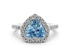 Fancy Blue Heart Cut Diamond Pavé Halo Ring Set in White gold with Prong Setting