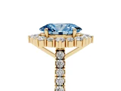 Fancy Blue Oval Cut Diamond Halo Ring Set in Yellow gold with Pavé Band and Prong Setting