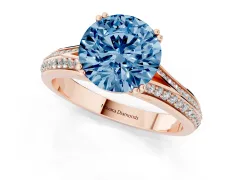 Fancy Blue Round Cut Diamond Split Shank Pavé Engagement Ring Set in Rose gold with Prong-Set Center Stone