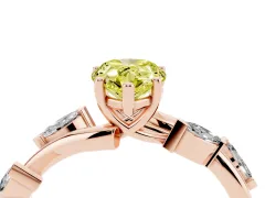 Fancy Yellow Pear Cut Diamond Solitaire Ring Set in Rose gold with Twisted Marquise Accent Band