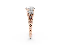 Heart Cut Diamond Three-Stone Ring Set in Rose gold with Braided Band