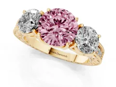 Fancy Pink Round Cut Diamond Three-Stone Engagement Ring Set in Yellow gold with Milgrain Pavé Band