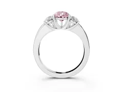Fancy Pink Pear Cut Diamond Three-Stone Ring Set in Platinum with Bold Center and Classic Band