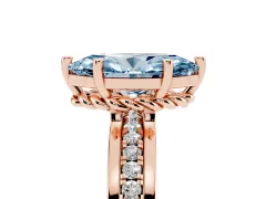 Fancy Blue Marquise Cut Diamond Solitaire Ring Set in Rose gold with Channel Set Band and Prong Setting