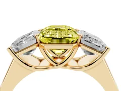 Fancy Yellow Emerald Cut Diamond Three-Stone Ring Set in Yellow gold with Plain Polished Band