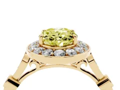 Fancy Yellow Oval Cut Diamond Halo Engagement Ring Set in Yellow gold with Twisted Band and Prong Setting