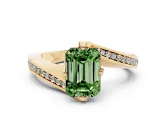 Fancy Green Emerald Cut Diamond Solitaire Ring Set in Yellow gold with Intertwined Pavé Twist Band