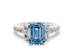 Fancy Blue Emerald Cut Diamond Three-Stone Pavé Ring Set in Silver with Prong Setting