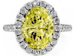 Fancy Yellow Oval Cut Diamond Halo Pavé Engagement Ring Set in Platinum with Prong Setting