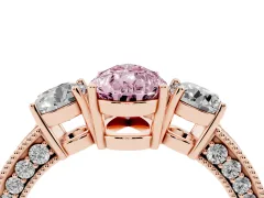 Fancy Pink Pear Cut Diamond Three-Stone Ring Set in Rose gold with Round Side Stones and Pavé Band