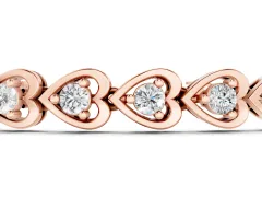 Heart Shape Diamond Tennis Bracelet Set in Rose gold with Channel and Four-Prong Setting