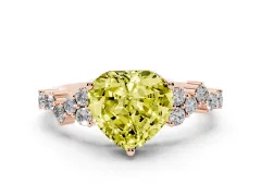 Fancy Yellow Heart Cut Diamond Ring Set in Rose gold with Scattered Round Accents