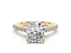 Radiant Cut Diamond Solitaire Ring Set in Yellow gold with Brilliant Pavé Band and Prong Setting
