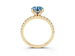 Fancy Blue Round Cut Diamond Pavé Solitaire Ring Set in Yellow gold with Round Band Accents and Prong Setting