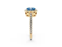 Fancy Blue Radiant Cut Diamond Halo Ring Set in Yellow gold with Pavé Shoulders and Halo-Framed Center