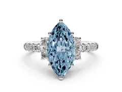 Fancy Blue Marquise Cut Diamond Three-Stone Pavé Ring Set in Platinum with Prong Setting