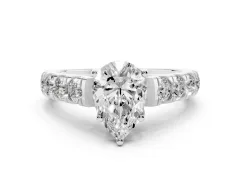 Pear Cut Diamond Solitaire Ring Set in Platinum with Cut-Down Micro Pavé Band and Prong Setting