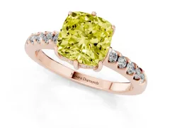 Fancy Yellow Cushion Cut Diamond Solitaire Engagement Ring Set in Rose gold with Pavé Band and Prong Setting