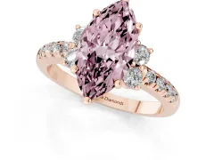 Fancy Pink Marquise Cut Diamond Three-Stone Pavé Ring Set in Rose gold with Prong Setting