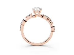 Pear Cut Diamond Solitaire Ring Set in Rose gold with Twisted Marquise Accent Band