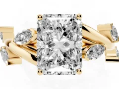 Radiant Cut Diamond Solitaire Ring Set in Yellow gold with Twisted Marquise Accent Band