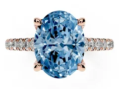 Fancy Blue Oval Cut Diamond Solitaire Ring Set in Rose gold with Brilliant Pavé Band and Prong Setting