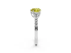 Fancy Yellow Heart Cut Diamond Solitaire Engagement Ring Set in White gold with Pavé Band and Prong Setting