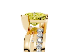 Fancy Yellow Radiant Cut Diamond Solitaire Ring Set in Yellow gold with Channel Set Split Shank and Tension Prongs