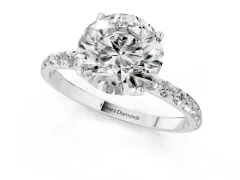 Round Cut Diamond Solitaire Engagement Ring Set in White gold with Round Pavé Band and Prong Setting