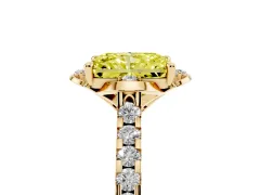 Fancy Yellow Radiant Cut Diamond Solitaire Ring Set in Yellow gold with Pavé Band and Floral Prong Setting
