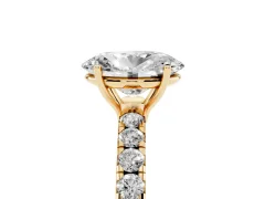 Oval Cut Diamond Pavé Solitaire Engagement Ring Set in Yellow gold with Prong Setting