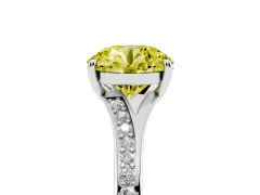 Fancy Yellow Round Cut Diamond Solitaire Ring Set in Platinum with Pavé Accent Band and Classic Prong Setting