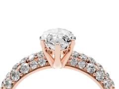 Marquise Cut Diamond Pavé Band Solitaire Ring Set in Rose gold with Close-Set Accent Stones and Prong Setting