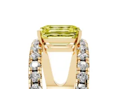 Fancy Yellow Emerald Cut Diamond Split Shank Pavé Solitaire Ring Set in Yellow gold with Open Shank Design