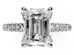 Emerald Cut Diamond Solitaire Ring Set in Silver with Brilliant Pavé Band and Prong Setting