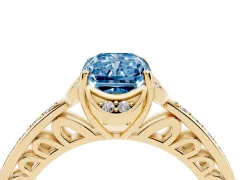 Fancy Blue Radiant Cut Diamond Halo Ring Set in Yellow gold with Channel Set Band and Prong Setting