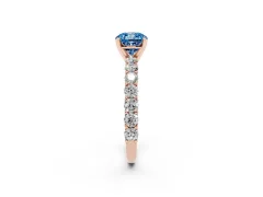 Fancy Blue Cushion Cut Diamond Solitaire Ring Set in Rose gold with Shared Prong Pavé Band