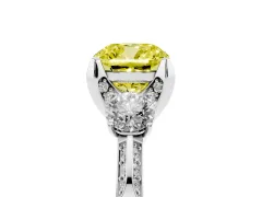 Fancy Yellow Cushion Cut Diamond Three-Stone Ring Set in Silver with Pavé Band and Smaller Side Stones