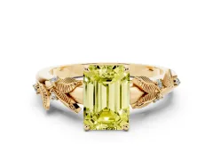 Fancy Yellow Emerald Cut Diamond Solitaire Ring Set in Yellow gold with Leaf Motif Band