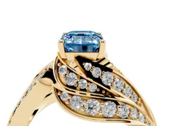 Fancy Blue Emerald Cut Diamond Solitaire Ring Set in Yellow gold with Layered Twist Pavé Band