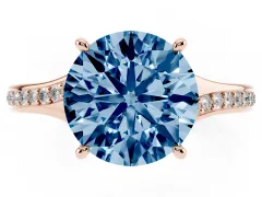 Fancy Blue Round Cut Diamond Solitaire Ring Set in Rose gold with Pavé Accent Band and Classic Prong Setting